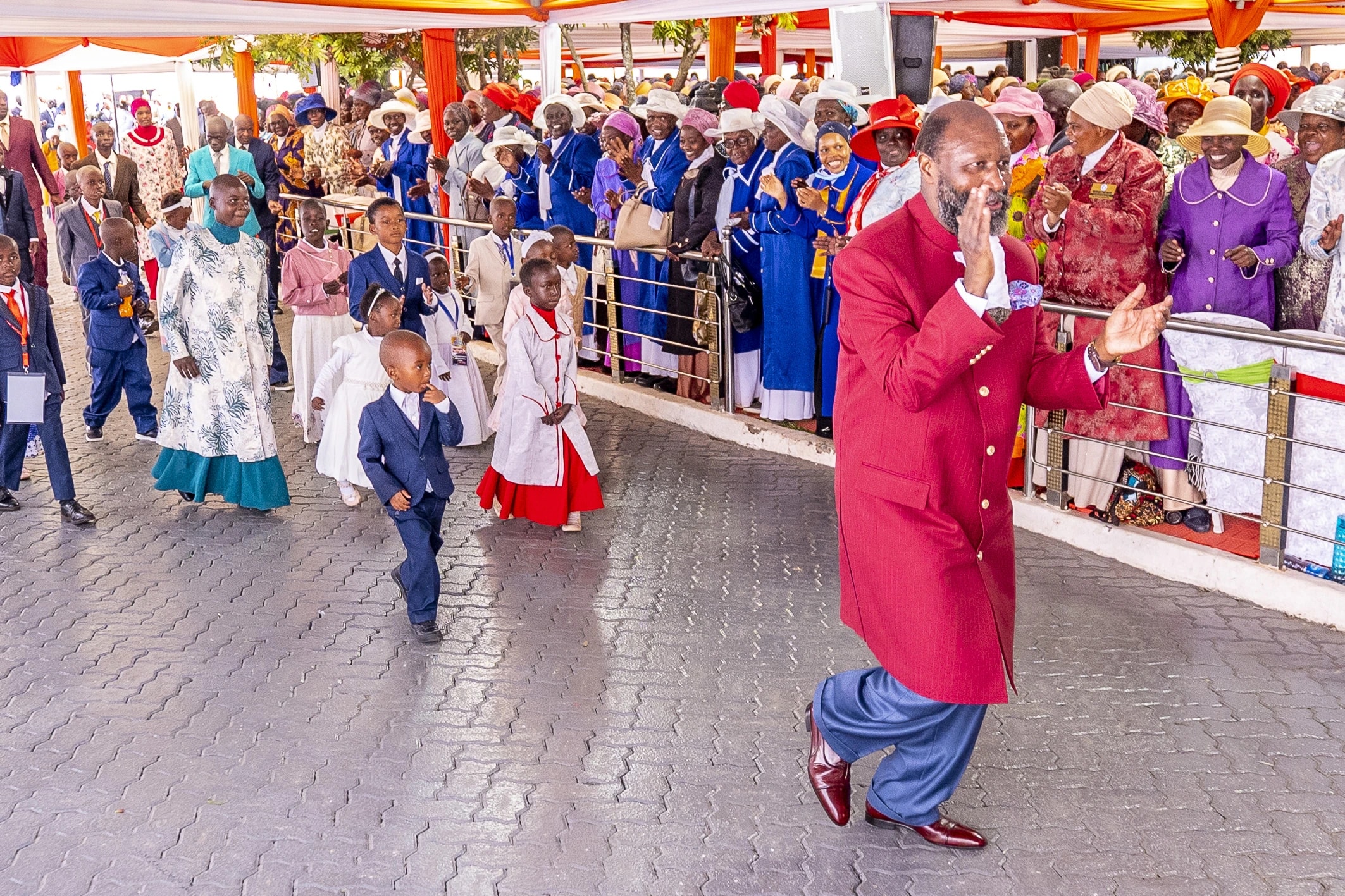 A procession receiving the Prophet at the Western Region revival.